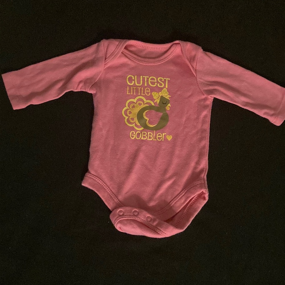 Pink one piece What is a turkey on it